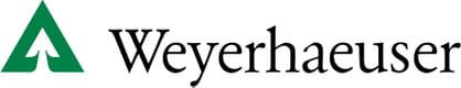 Weyerhaeuser logo. Black type next to a green triangle with a tree reversed in white.