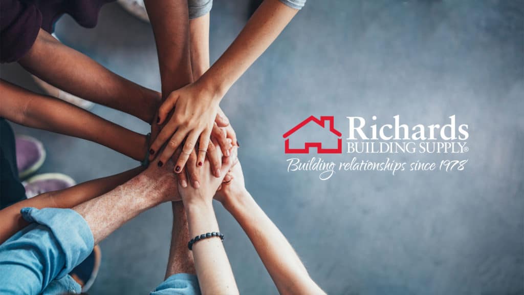 Richards Building Supply logo with hands