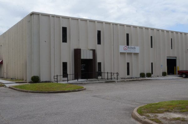 Richards Building Supply in Chesapeake, VA. A 2 story beige colored building.