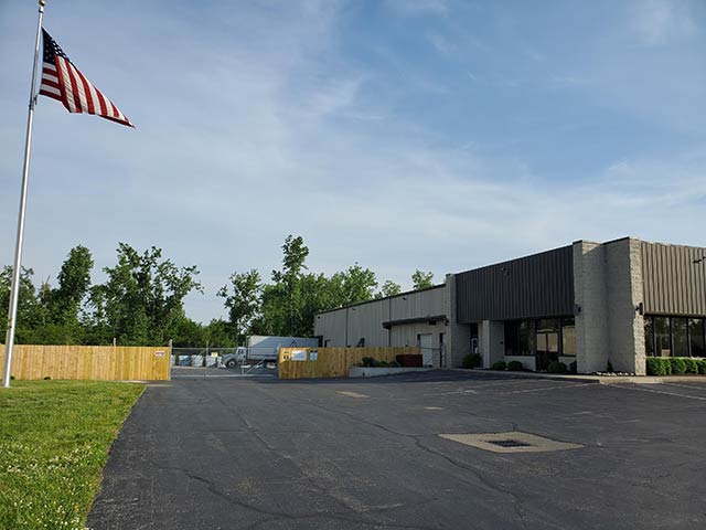Richards Building Supply in Dayton, OH. Light and dark brown brick building.