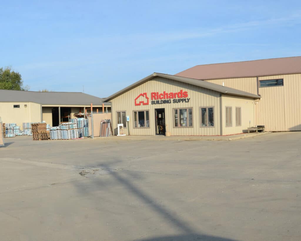 Richards Building Supply in Kankakee, IL. Large, light brown metal building.
