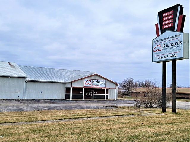 Richards Building Supply in Merrillville, IN. Single story beige metal building.
