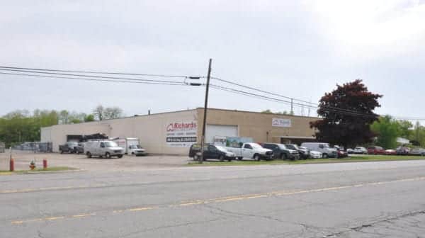 Richards Building Supply in Michigan City, IN. Single story beige metal building.