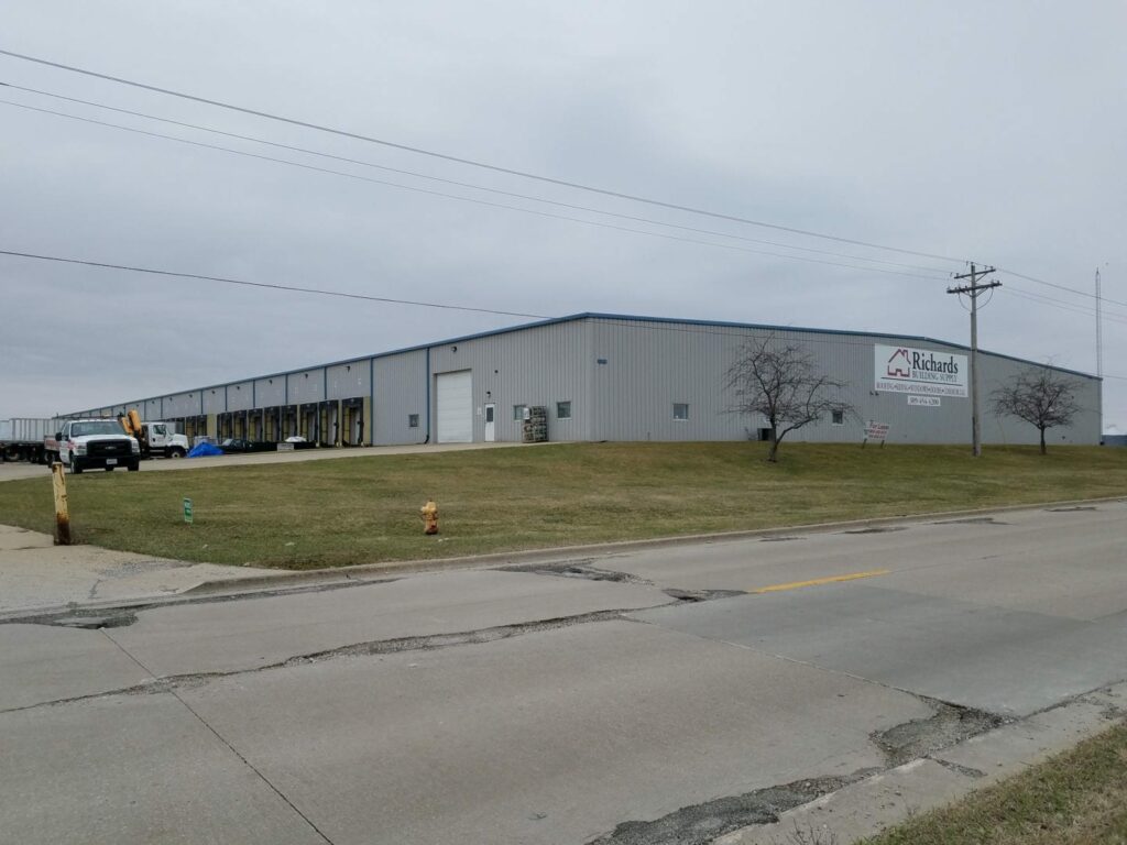 Richards Building Supply in Normal, IL. Large gray metal building.