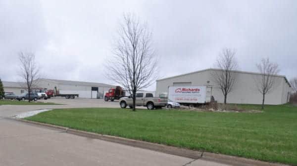 Richards Building Supply in Peoria, IL. Large beige metal building.