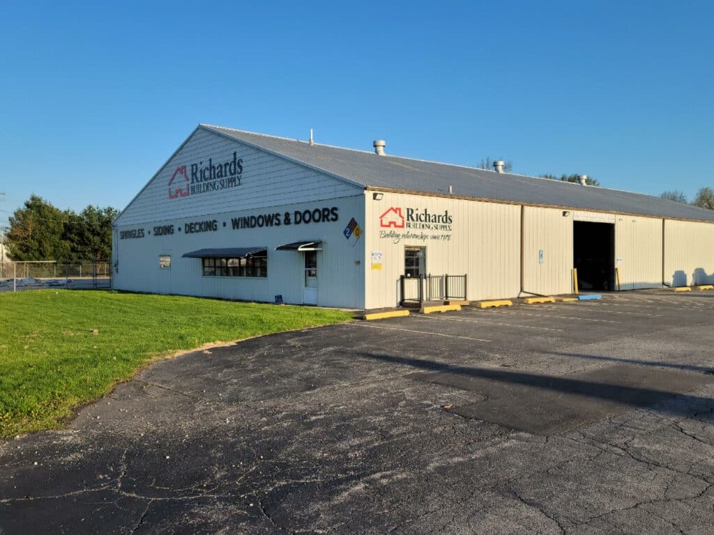 Richards Building Supply in Springfield, IL. Single story, wide beige metal building.