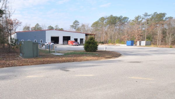 Richards Building Supply in Richmond, VA. Single story white and gray metal building.
