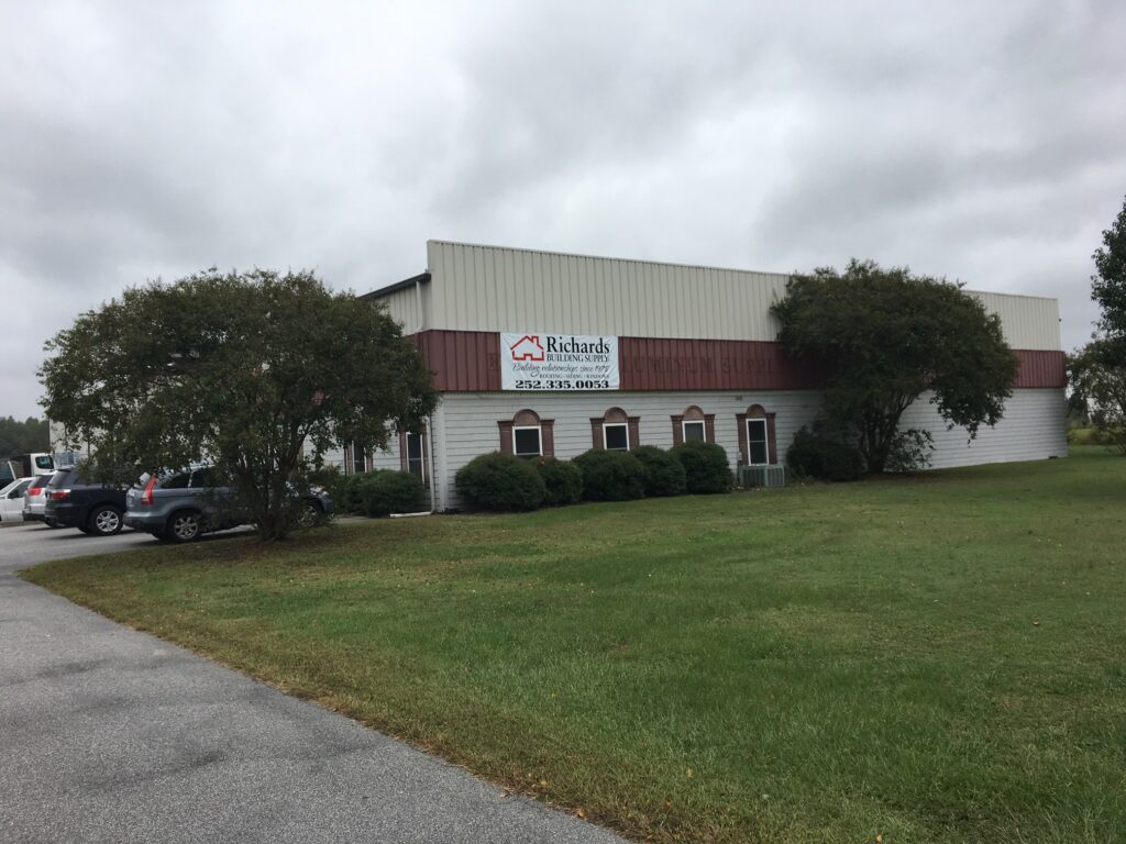 Richards Building Supply in Elizabeth City, NC. Single story beige and brown building