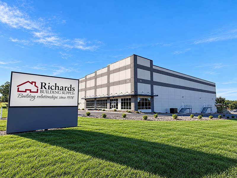 Richards Building Supply in Greer, SC. Dark gray and beige building.