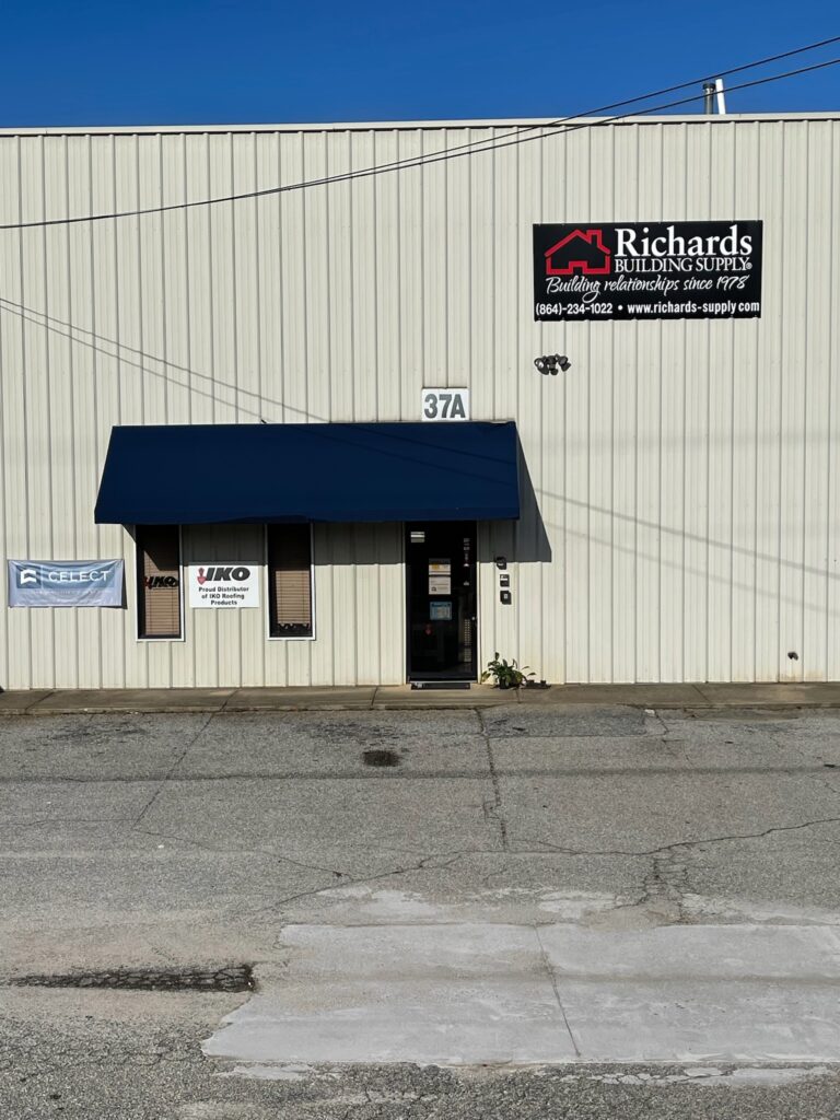 Richards Building Supply in Greer, SC. Single story beige metal building.