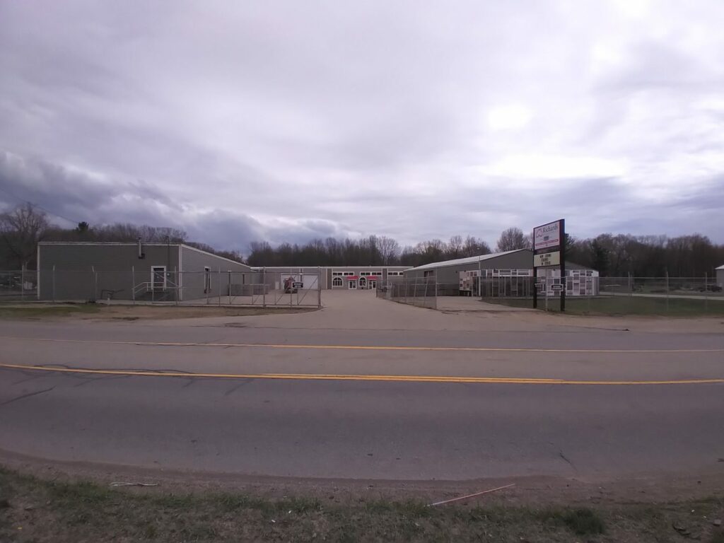 Richards Building Supply in Holland, MI. Single story gray metal building.