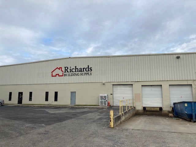 Richards Building Supply in Ladson, SC. Two story beige metal building.