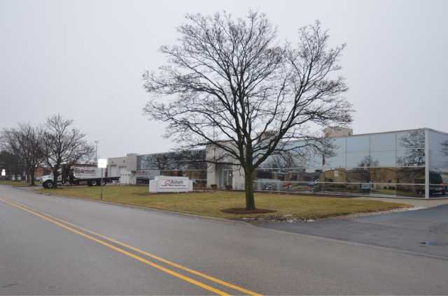 Richards Building Supply in Rolling Meadows, IL. Single story glass building.