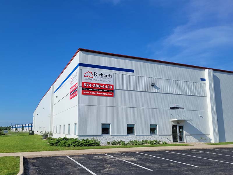 Southbend, IN location. White 2 story building with the Richards Building Supply logo on the sides