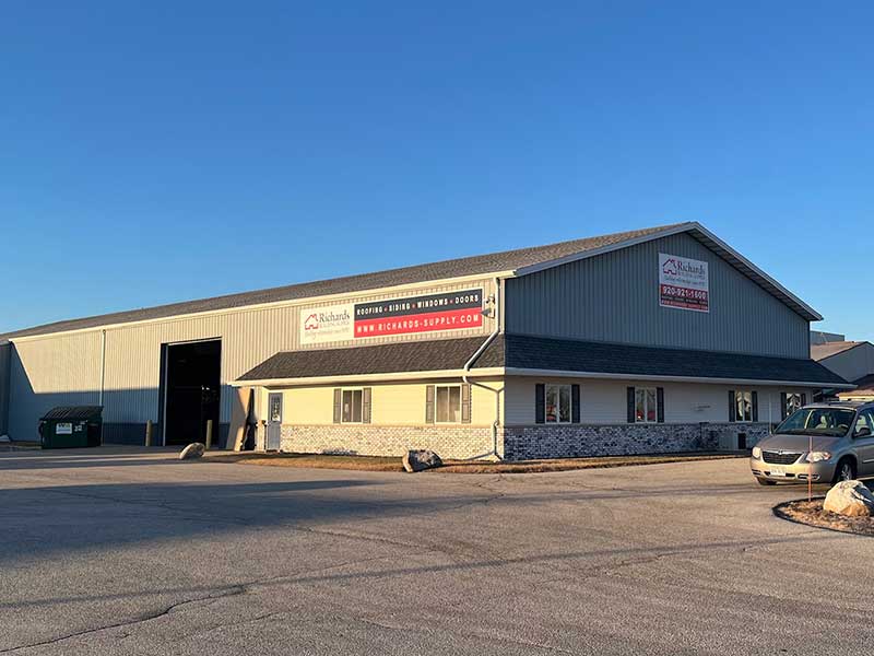 Richards Building Supply in Fond Du Lac, WI. Light grey metal building.