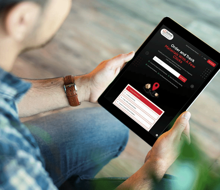 Person holding a mobile tablet with ordering information for Richards Supply